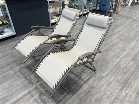 2 NEW FOLDABLE PATIO LOUNGERS