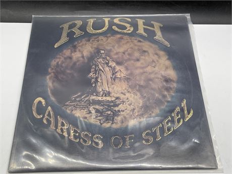RUSH - CARESS OF STEEL - EXCELLENT (E)