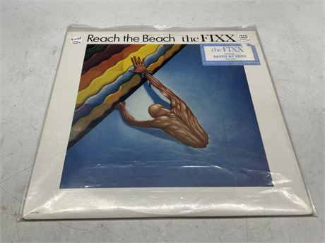1983 PRESS THE FIXX - REACH THE BEACH - EXCELLENT (E)