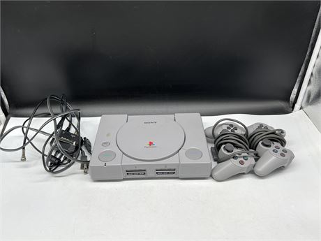 PS1 SYSTEM W/ 2 CONTROLLERS & CORDS