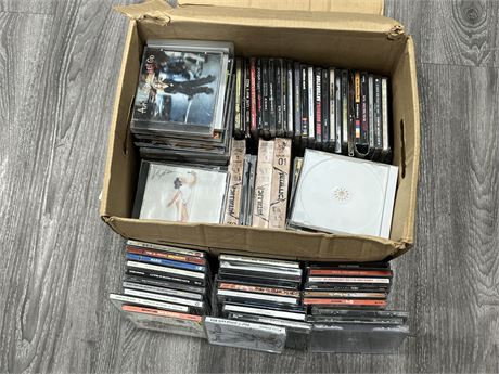 BOX OF CDS W/SOME VHS’