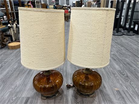 PAIR OF VINTAGE AMBER BROWN GLASS LAMPS WITH ORIGINAL SHADES - 32” TALL