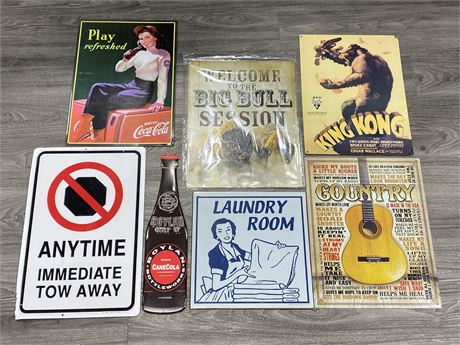 7 VARIOUS TIN SIGNS (LARGEST IS 12”X18”)