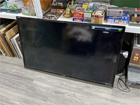 SHARP 60” TV - POWERS UP, NO REMOTE, HAS DAMAGE ON BACK