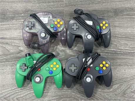 4 N64 CONTROLLERS - ALL 4 HAVE LOOSE STICKS