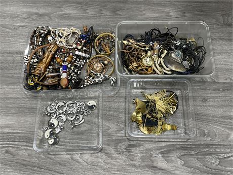 4 TRAYS OF MISC JEWELRY INCL: CARVED AFRICAN, BRASS, CORD NECKLACES, ETC