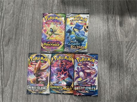 5 SEALED ASSORTED BOOSTER PACKS