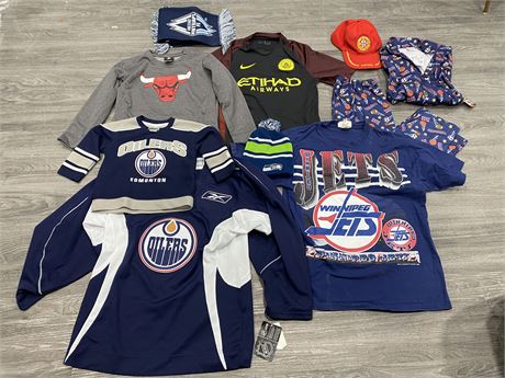 BOX OF ASSORTED SPORTS CLOTHES (KIDS + ADULT SIZES)