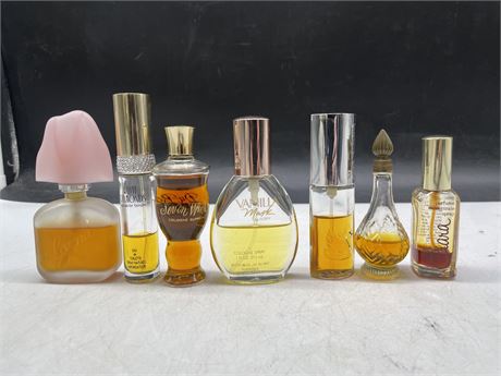 7 HIGH END PERFUME BOTTLES PARTIALLY FILLED