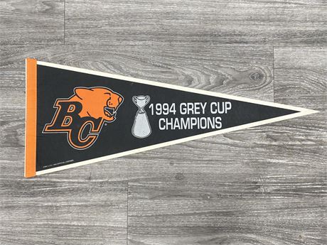 SIGNED 1994 BC LIONS GREY CUP CHAMP PENNANT (29”X12”)