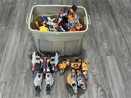 LARGE CONTAINER OF TRANSFORMERS TOYS