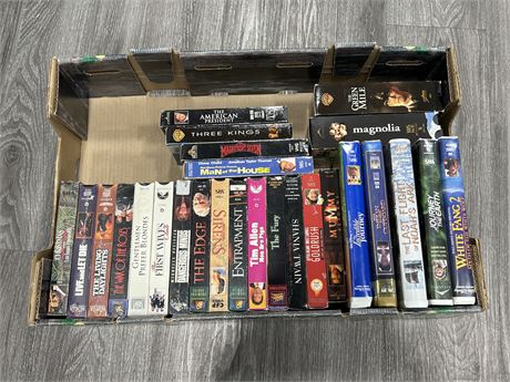 OVER 25 VHS W/ 7 SEALED