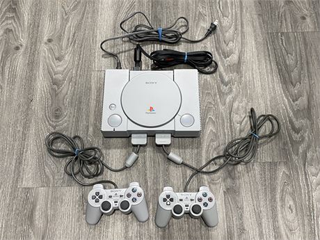 WORKING SONY PLAYSTATION ONE WITH 2 CONTROLLERS
