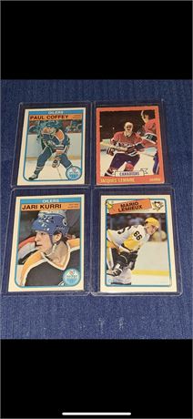 (4) 70’s / 80’s HOCKEY CARDS INCLUDING JACQUES LEMAIRE ROOKIE CARD