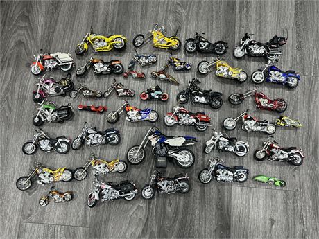 COLLECTION OF SMALL MOTORCYCLES - MOSTLY DIECAST  (2-5”)