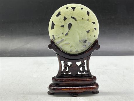 JADE DISC CARVING ON WOODEN STAND (4”)