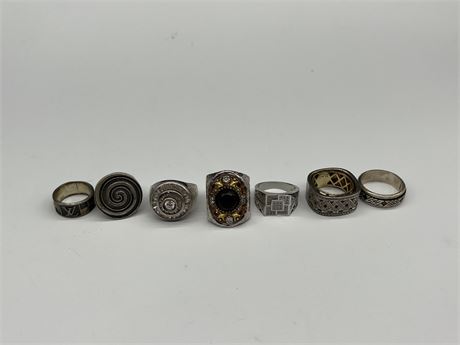 7 RINGS - MARKED 925 SILVER - LARGEST IS SIZE 12