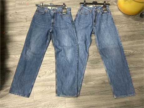 2 PAIRS OF NEW W/TAGS LEVIS JEANS - SIZE 28 WAIST