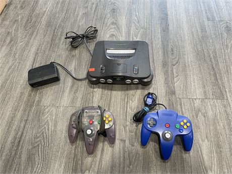 N64 CONSOLE W/ POWER CORD & 2 CONTROLLERS (MISSING AV CORDS)