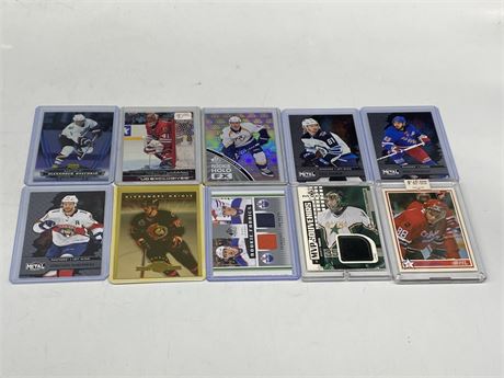 10 MISC NHL CARDS - INCLUDES ROOKIES & JERSEY CARDS