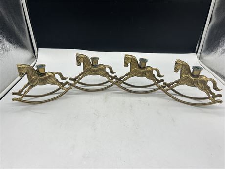 4 VINTAGE BRASS ROCKING HORSE CANDLE HOLDERS - 7.5” X 5.5”