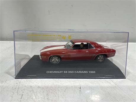 SCALEXTRIC USA CHEVROLET SS 350 CAMERO 1969 SLOT CAR WITH AN EXTRA CONNECTOR