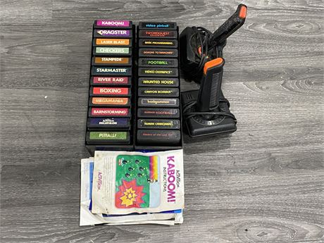 24 ATARI 2600 GAMES W/2 JOYSTICKS - SOME W/INSTRUCTIONS (NOT TESTED - AS IS)