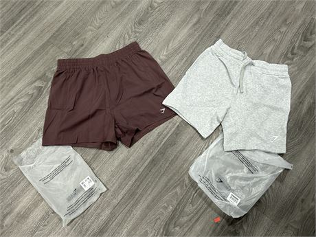 2 NEW PAIRS OF GYMSHARK SHORTS - SIZE XS & M