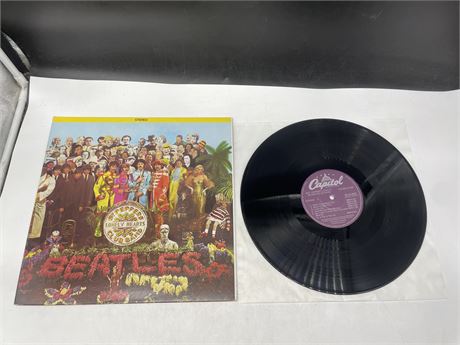 THE BEATLES - SGT. PEPPER’S LONELY HEARTS CLUB BAND W/ CUT-OUT INSERT & PURPLE