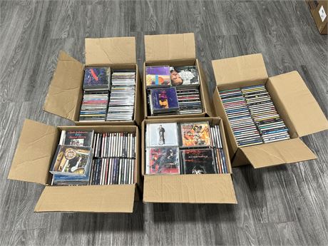 5 MEDIUM SIZED BOXES OF CDS