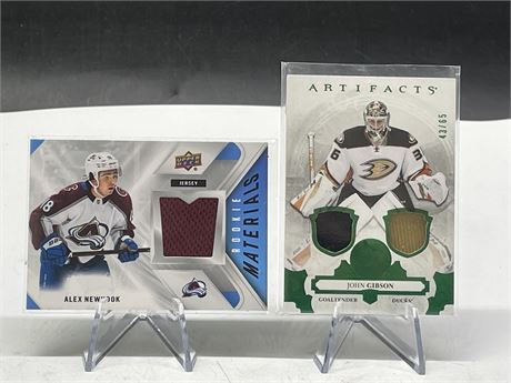 2 JERSEY CARDS INCL: ARTIFACTS NUMBERED JOHN GIBSON & ALEX NEWHOOK ROOKIE CARD