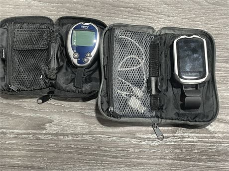 2 GLUCOSE METERS IN CASES
