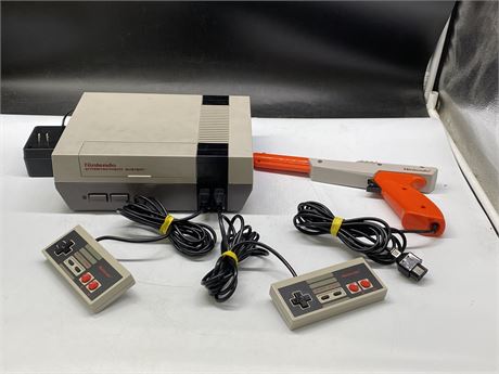 NINTENDO NES SYSTEM WITH POWER CORD, 2 CONTROLLERS, & GUN