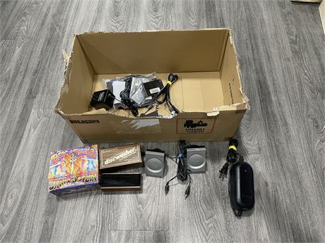 MISC BOX OF BOSE REMOTES, POWER SUPPLY, SPEAKERS, ETC