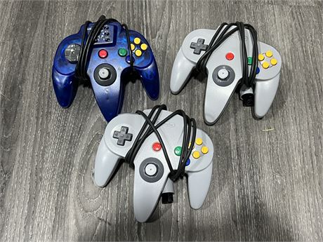 3 N64 CONTROLLERS INCLUDING 3RD PARTY CONTROLLER