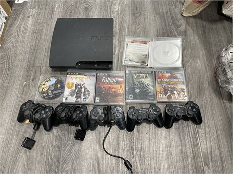 PS3 WITH CONTROLLERS (PS3 & PS2) & 5 GAMES (CALL OF DUTY CASE ONLY)