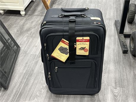 EDDIE BAUER 25” SUITCASE NEVER USED - HAS STRONG SMOKE SMELL