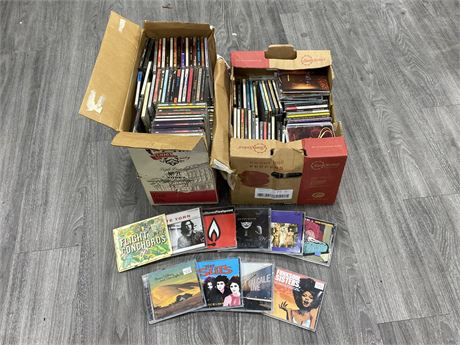 2 BOXES OF MISC CDS