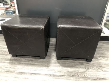 TWO LEATHER OTTOMANS