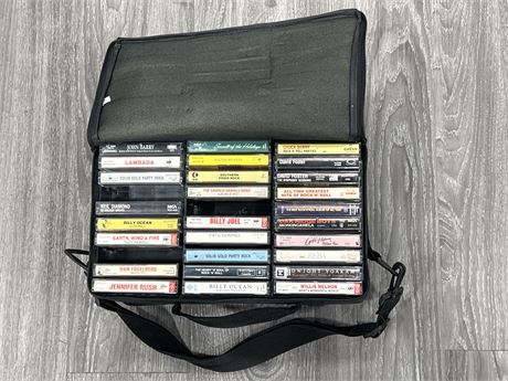 LOT OF MISC CASSETTES IN CARRY CASE