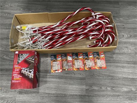 LOT OF CHRISTMAS DECOR INCLUDING CANDY CANE OUTDOOR LIGHTS (WORKS) & LIGHT CLIPS