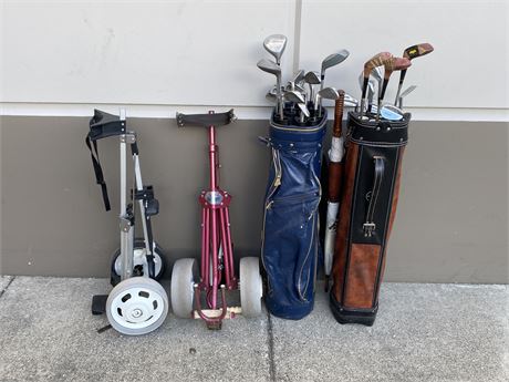 2 SETS OF RIGHT HANDED GOLF CLUBS W/BAGS & PULL CARTS