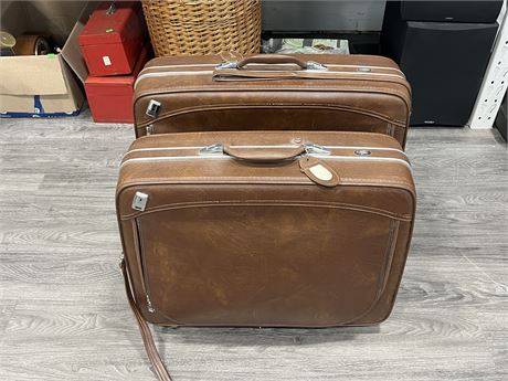 2 DIONITE ROLLING SUITCASES