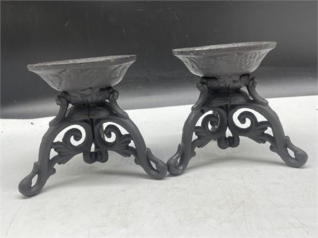 2 CAST IRON CANDLE HOLDERS 5”