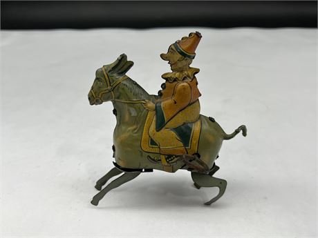ANTIQUE TIN TOY - WORKS (5.5” tall)