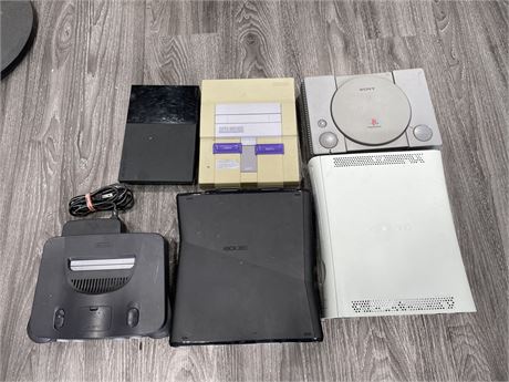 6 VIDEO GAME SYSTEMS (N64 Comes w/ power cord) (AS IS)