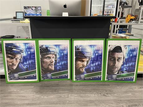 4 FRAMED VANCOUVER CANUCKS 2011 PLAYOFF POSTERS (21”x29”)