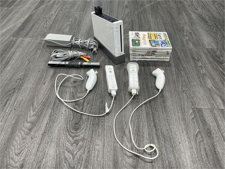 NINTENDO WII CONSOLE COMPLETE W/ CONTROLLERS, CORDS & GAMES