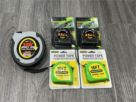 4 NEW MEASURING TAPES + 1 NEW 100FT ROLL UP MEASURING TAPE