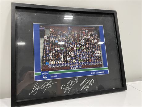 SIGNED CANUCKS PHOTO “WE ARE ALL CANUCKS” (21”x17”)